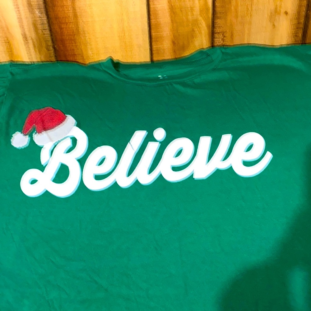 FLASH SALE NWOT BELIEVE W/Santa hat green tee white letters cute Christmas tee